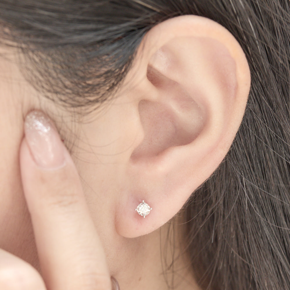 18K round brilliant diamond illusion stud earrings 0.12ct tw. A00150 - FABER JEWELS