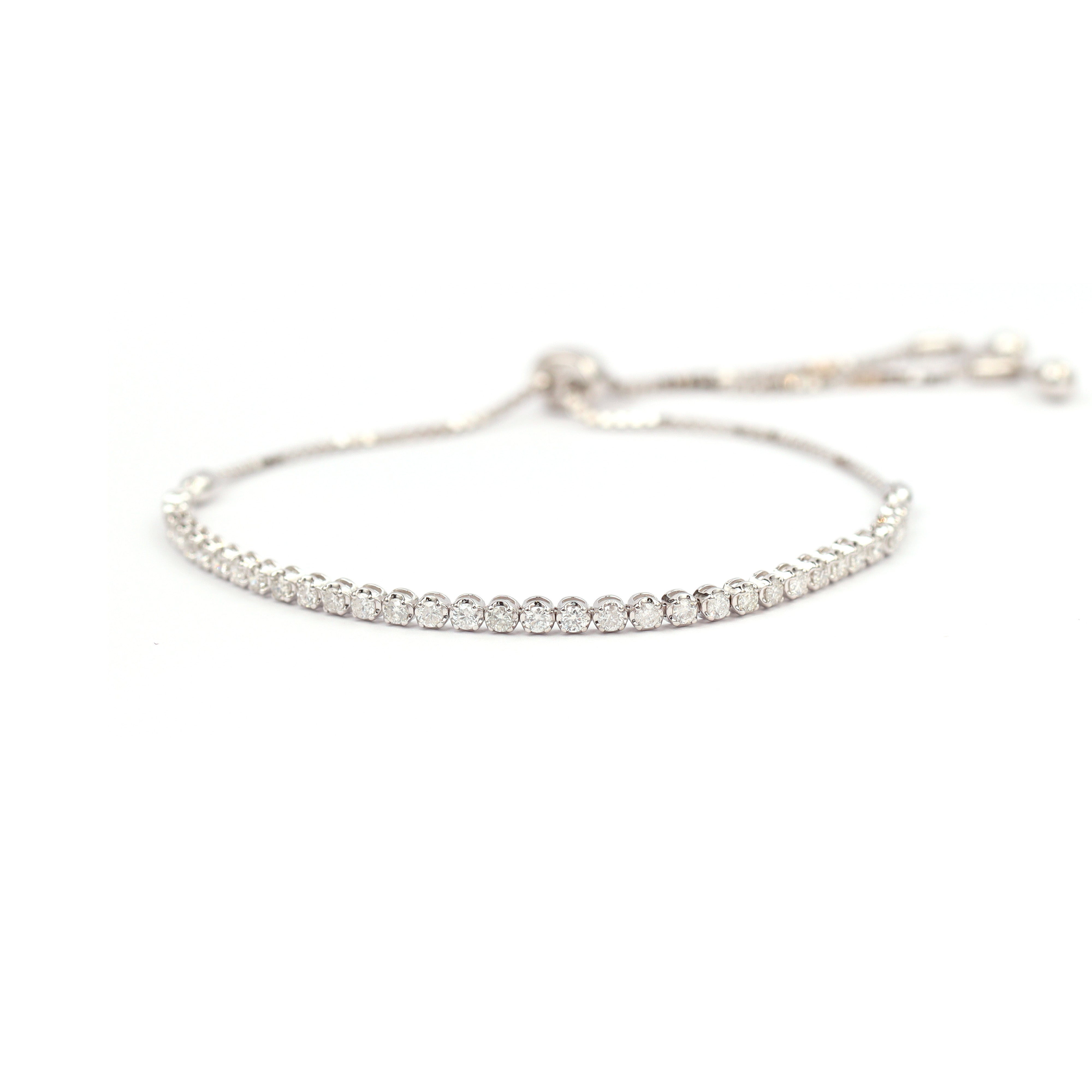 18K gold round brilliant diamond slider tennis bracelet 0.72ct tw. A00103 - FABER JEWELS